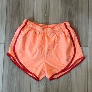 Nike Women's Athletic Shorts in Orange with Red Accents